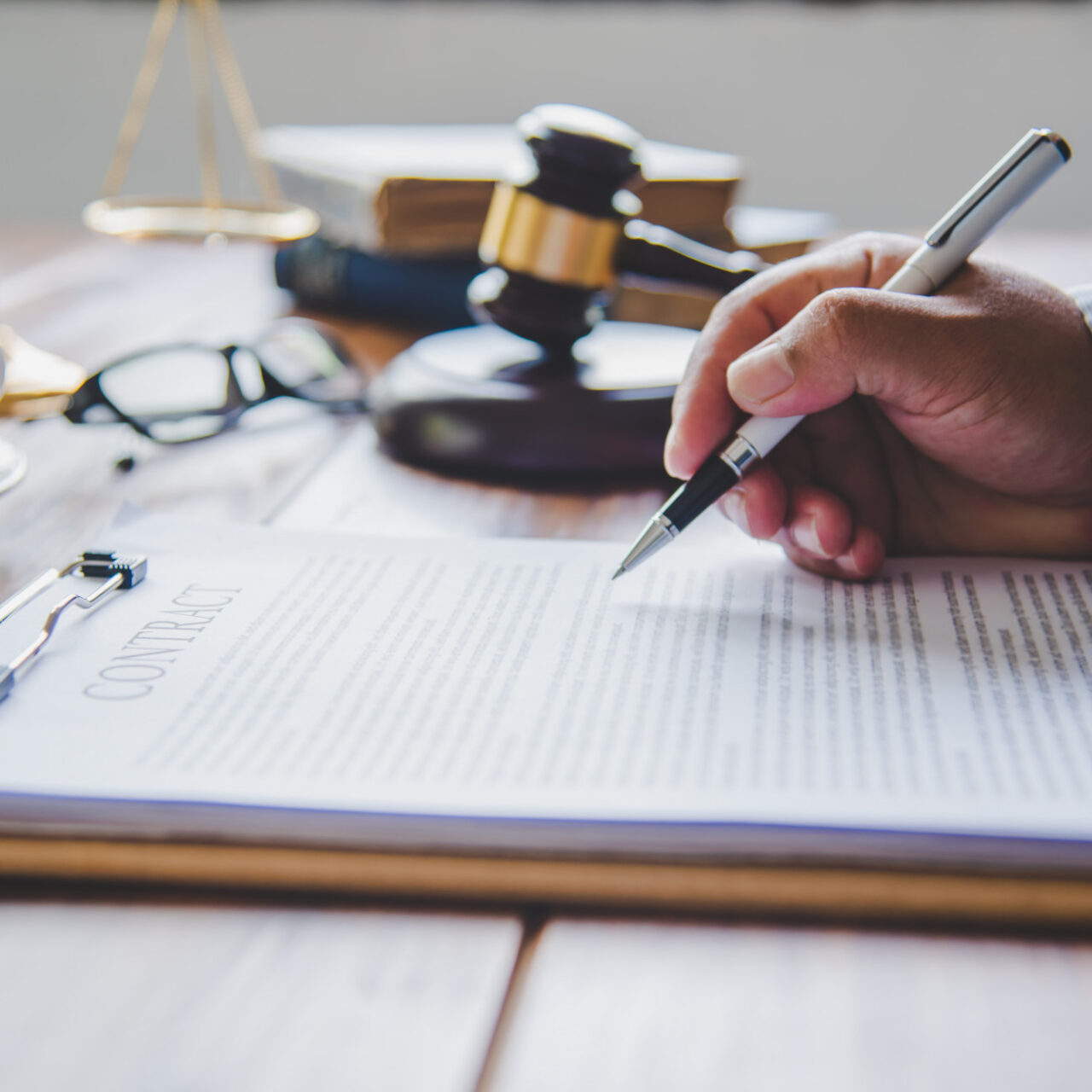 https://ovblaw.flywheelsites.com/wp-content/uploads/2021/11/judge-signing-documents-1280x1280.jpg