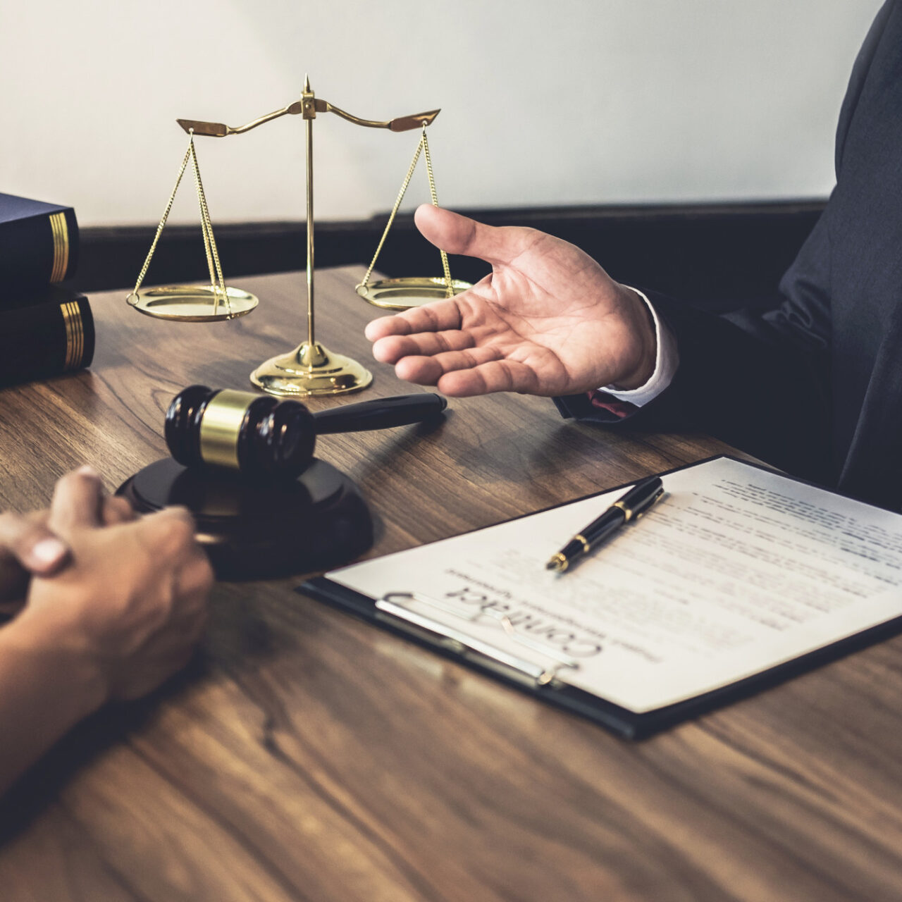 https://ovblaw.flywheelsites.com/wp-content/uploads/2021/12/lawyer-judge-counselor-having-team-meeting-with-client-law-legal-services-1280x1280.jpg